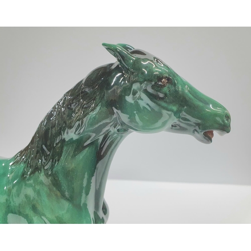 92 - Beswick horse with rare green colouring,

approx 26cm long by 21cm tall