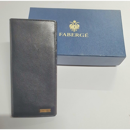 72 - Faberge (as new) black leather wallet and box