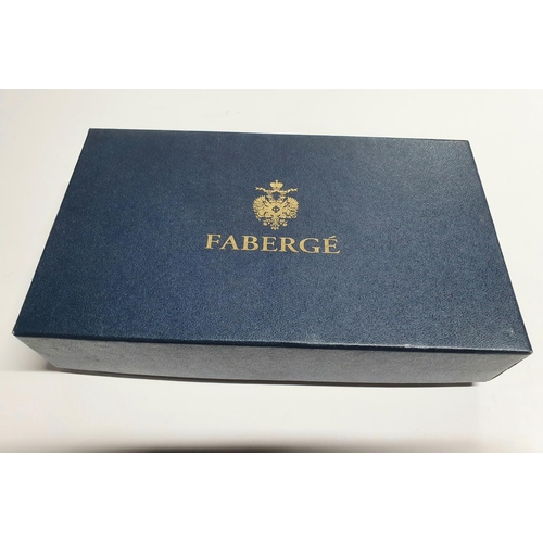 72 - Faberge (as new) black leather wallet and box