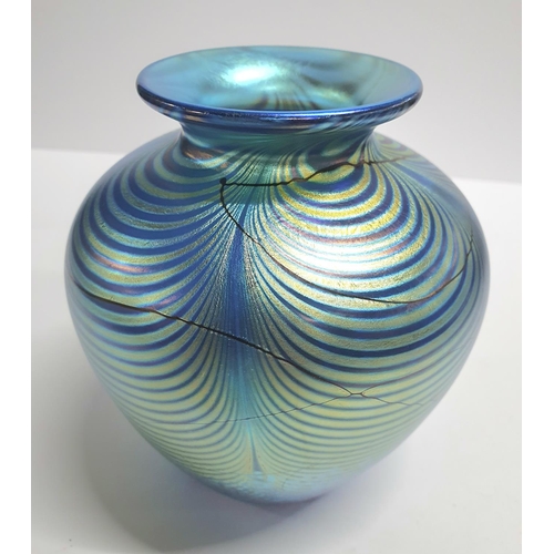 104 - Boxed, as new, Okra iridescent Art Nouveau bulbus form glass vase,

15cm tall