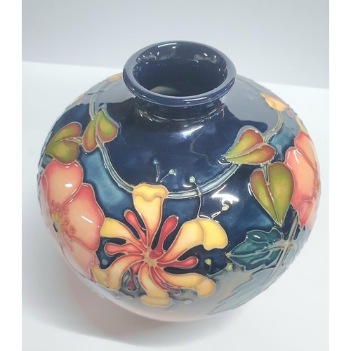 109 - Moorcroft bulbus vase c1990s with original box,

18cm tall