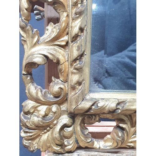 26 - 19thC hand-carved Florentine wood & gesso frame containing a bevel edged mirror,

Internal measureme... 