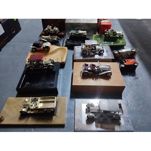 399 - Variety of old model cars on stands