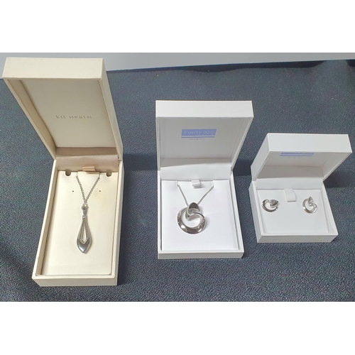 41 - Purity 925 silver necklace and associated earrings both in original boxes together with another boxe... 