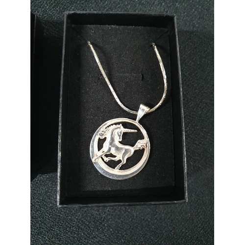 26 - 925 silver Unicorn pendant on silver chain together with a large silver heart pendant on silver chai... 