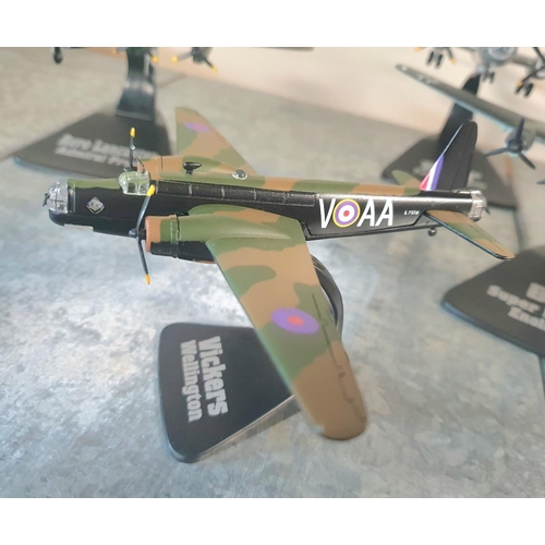 90 - Six metal WWII model military planes on stands (6)