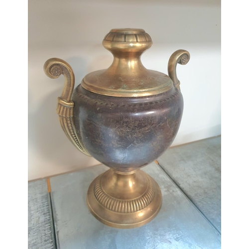 98 - Old, over-sized two-handled brass and leather urn