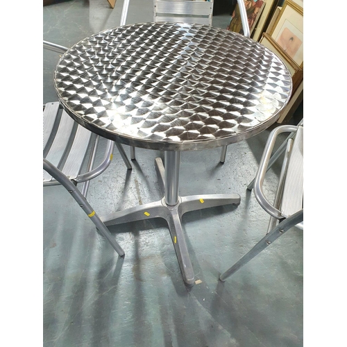 509 - Aluminum outdoor table with four matching chairs