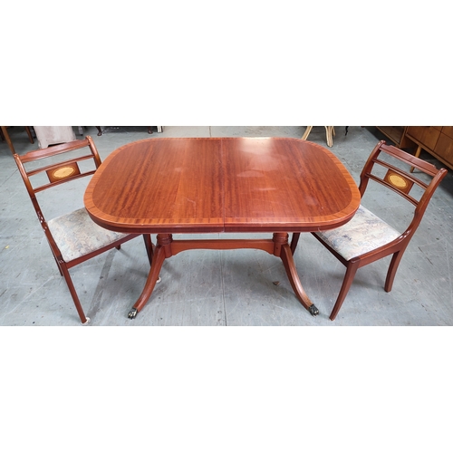 511 - McIntosh, rosewood extending dining table and two McIntosh inlaid dining chairs (2)