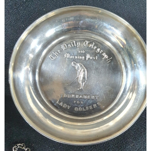 25 - Silver golfing pin dish together with an engraved silver bangle in its own presentation box and a si... 