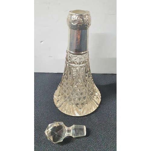 427 - Silver coloured, antique cut-glass perfume bottle