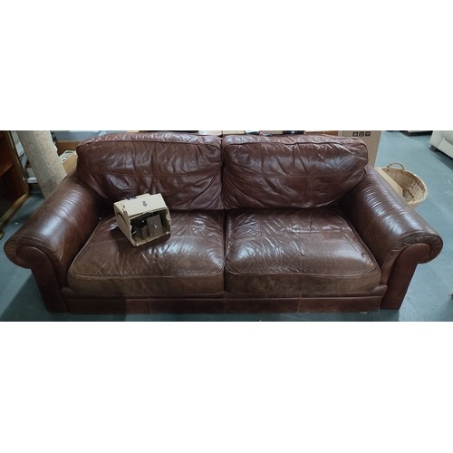 627 - Brown leather sofa and armchair, with feet (2)