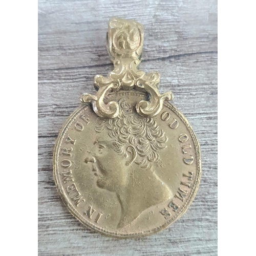 70 - Antique brass pendent in the form of a Georgian sovereign