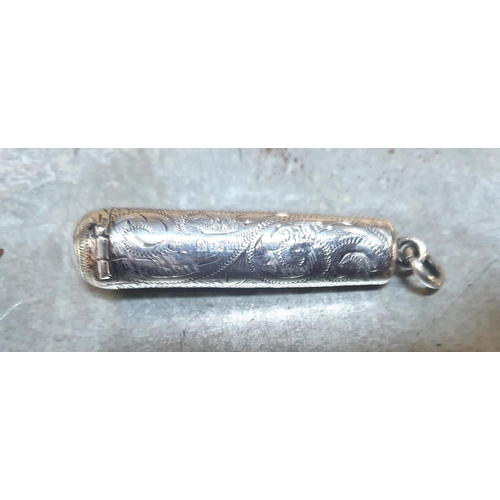 23 - Ornately engraved 20thC silver case for a cigarette holder