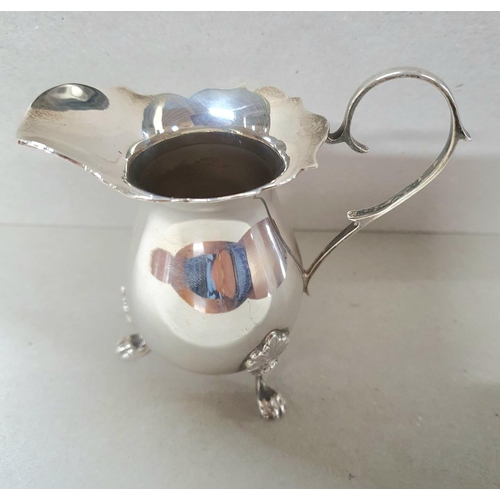 1 - Birmingham 1959 silver 3-footed milk jug in classical form,

95 grams