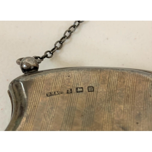 8 - A hallmarked silver engine turned monogrammed Birmingham 1911 evening purse,

106 grams