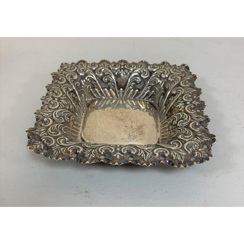 11 - A square Sheffield 1896 silver dish with an extensive embossed acanthus border,

70 grams