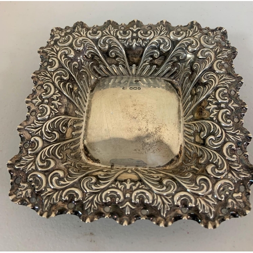 11 - A square Sheffield 1896 silver dish with an extensive embossed acanthus border,

70 grams