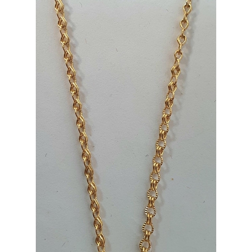 29 - Fine, long  9ct fine gold chain with plastic 3-d circular pendent,

7.2 grams gross         chain ap... 