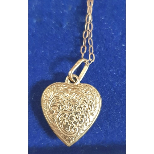 31 - Two boxed, 9ct gold etched lockets on fine 9ct gold chains (2),

Total approx weight 3 grams