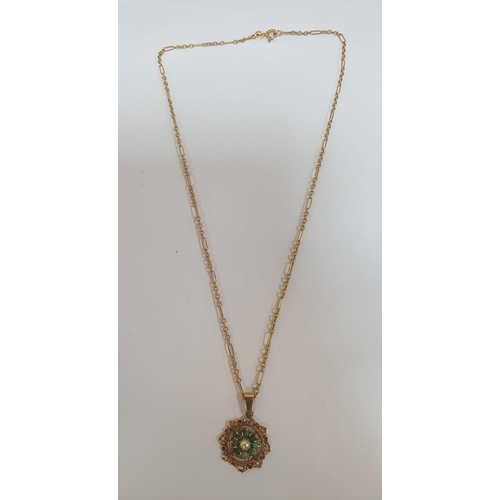 113 - Large 9ct yellow gold pendent with a central pearl surrounded by small Jade cabochons on a 9ct yello... 