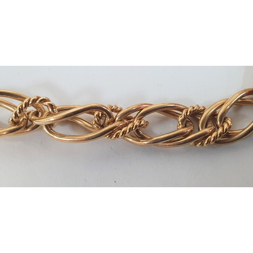 84 - 9ct gold interwoven bracelet,

12.6 grams            18cm long