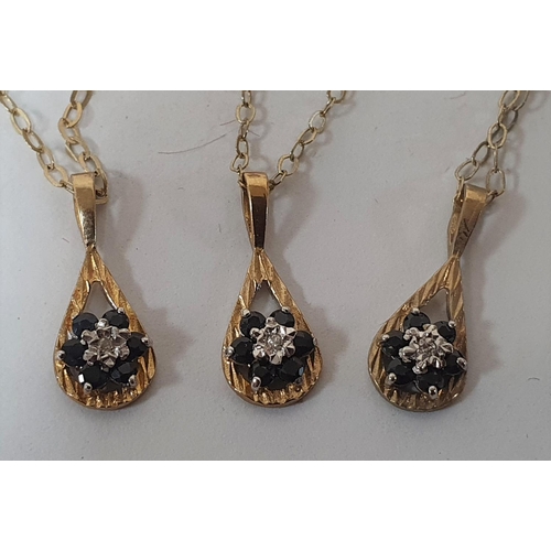 142 - Three 9ct gold pendants, all with an illusion set diamond surrounded by six round cut Sapphires and ... 