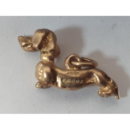 144 - Two 9ct gold hound dog charms/pendants (2),

3.4 grams