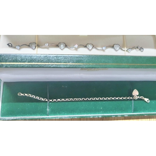 56 - Four silver bracelets, all as new and in their presentation boxes (4)