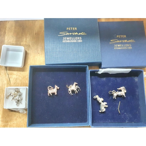 58 - Six silver charms, all as new and some in presentation boxes (6)