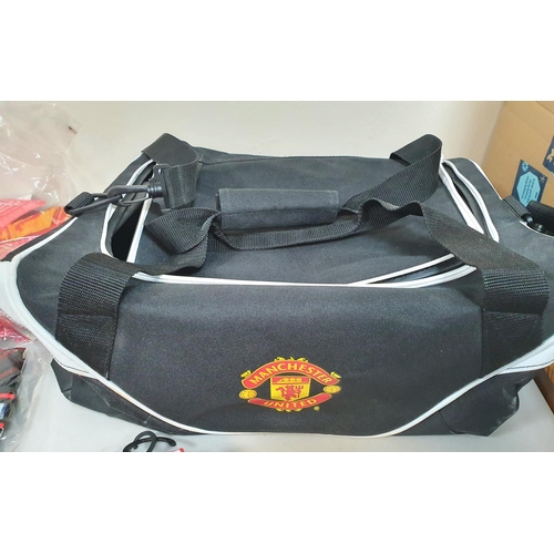 174 - Collection of mainly, as new, genuine Manchester United F C items to include a carry bag, a T-shirt,... 