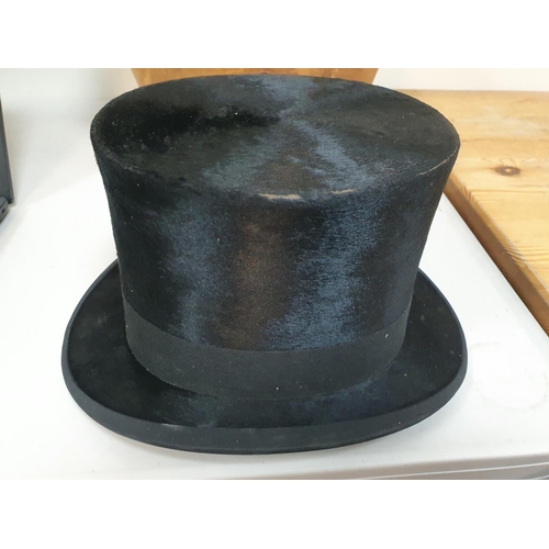 179 - Dunn & Co. top hat, with original leather hat box