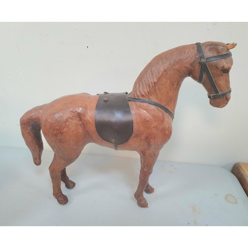 180 - Retro leather horse,

36cm long x 32cm high