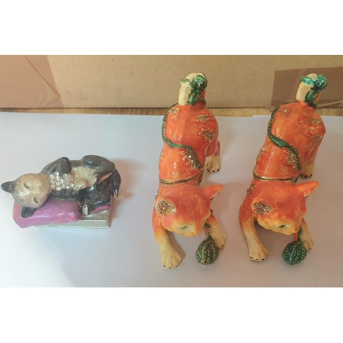 206 - Seven good quality enameled metal trinket/ring boxes in the form of Pigs and Cats (7)