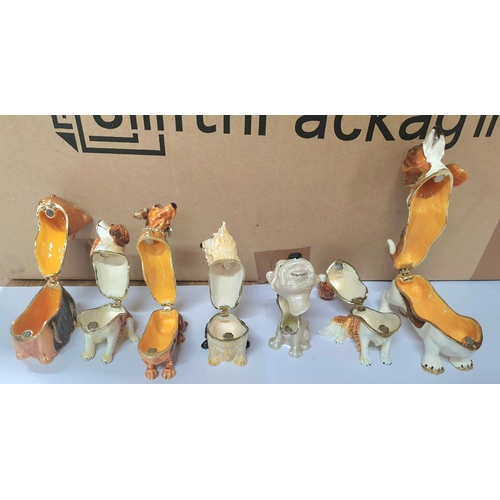 208 - Seven good quality enameled metal trinket/ring boxes in the form of Dog figurines (7)