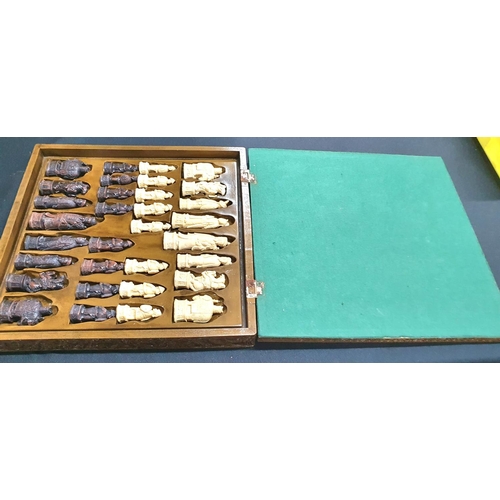 247 - Complete chess set with Chinese style resin figures stored in compartment below