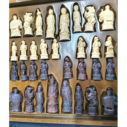 247 - Complete chess set with Chinese style resin figures stored in compartment below