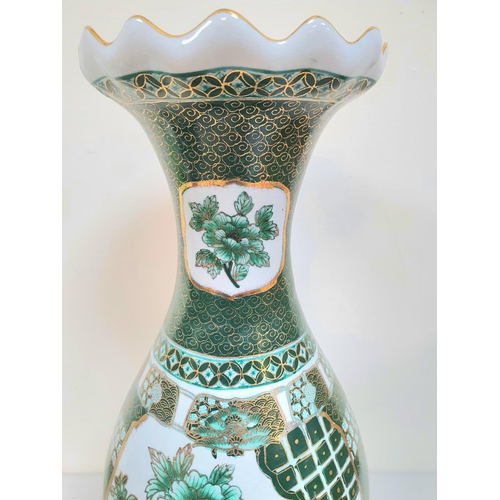 476 - Large green Oriental floor vase with patterned edge, marked to base,

47cm tall