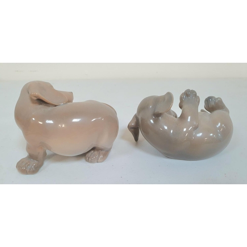 518 - Two small Royal Copenhagen puppy ceramics (2)