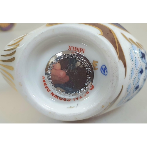 522 - Royal Crown Derby paper-weight, Shona Bear - gold stopper together with a silver stoppered Royal Cro... 