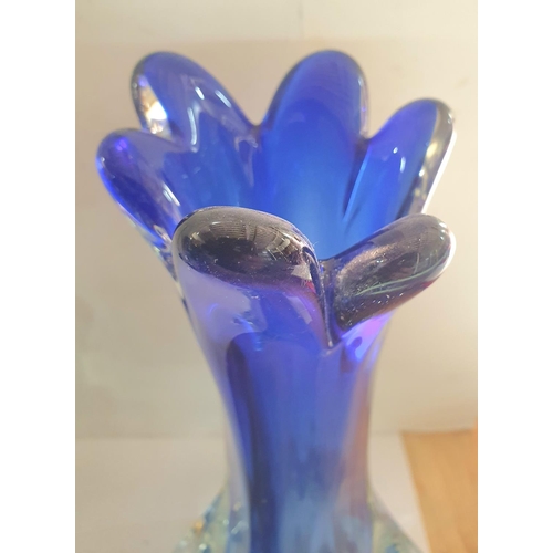 530 - Vintage Murano blue glass vase together with a Murano Seguso Sommerso centre piece (2),

Vase is 28c... 