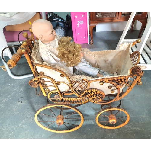 396 - Early 20thC childs pram complete with 2 later, limited edition dolls