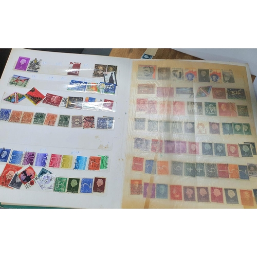 450 - Four stamp albums including a whole album of German, good collection of Japan, China and Hong Kong, ... 