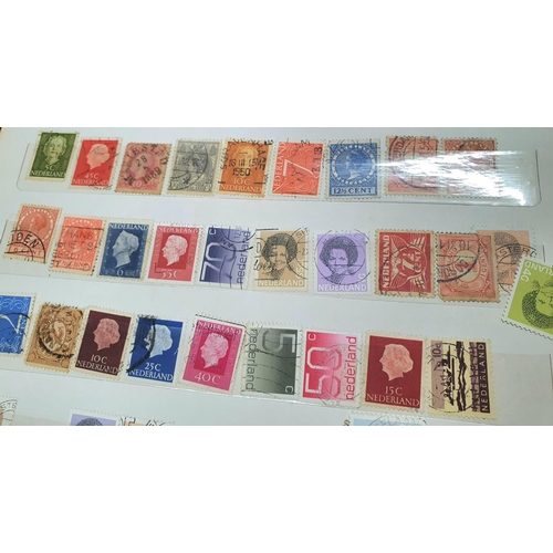 450 - Four stamp albums including a whole album of German, good collection of Japan, China and Hong Kong, ... 