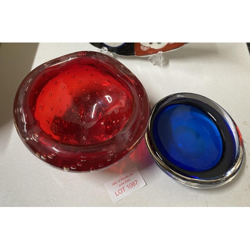 1067 - 2 small retro coloured glass ashtrays