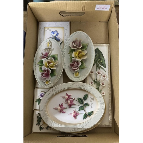 1081 - Ceramic flowers plaques.