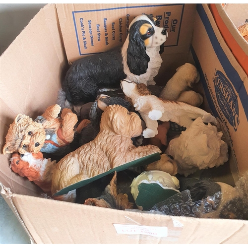 1209 - box of resin dog figurines