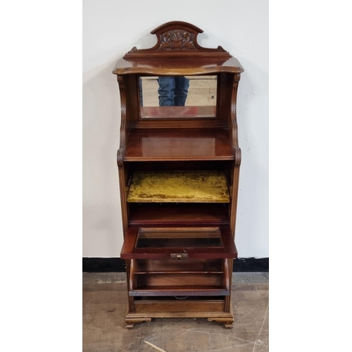 423 - Ornate hall cabinet, lined with mirrored backing