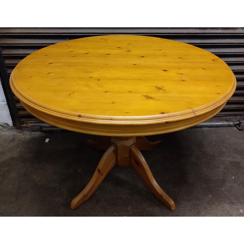 433 - Round Pine extending dining table on pedestal base