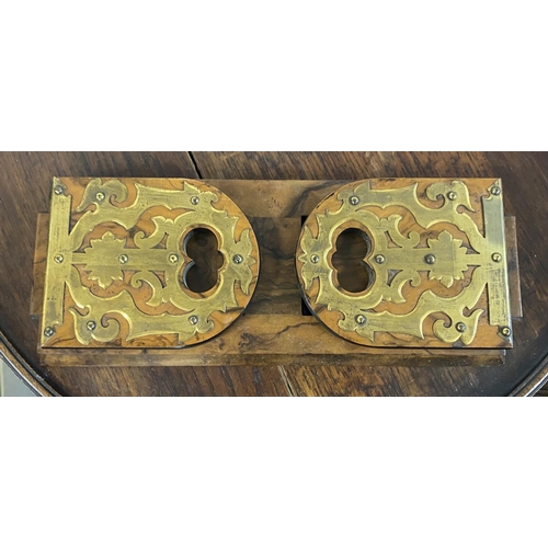 40 - Antique burr Walnut veneered book end with brass escutcheons.